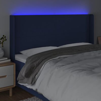 vidaXL Čelo postele s LED modré 183x16x118/128 cm látka