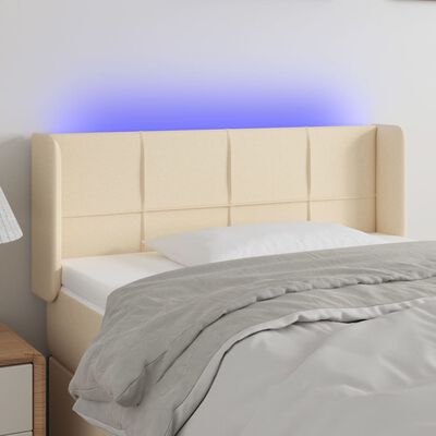 vidaXL Čelo postele s LED krémové 83x16x78/88 cm látka