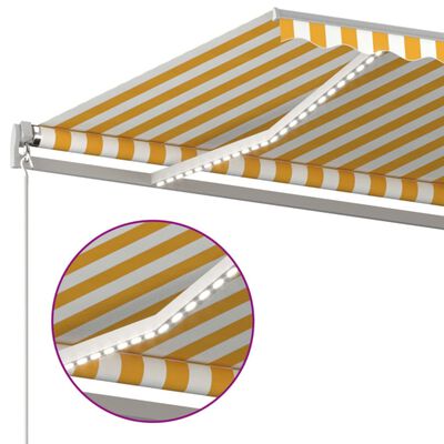 vidaXL Ručne zaťahovacia markíza s LED 600x300 cm žltá a biela