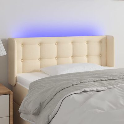 vidaXL Čelo postele s LED krémové 83x16x78/88 cm látka