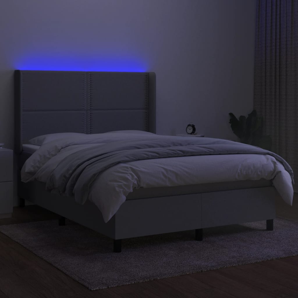 vidaXL Posteľ boxsping s matracom a LED bledosivá 140x190 cm látka